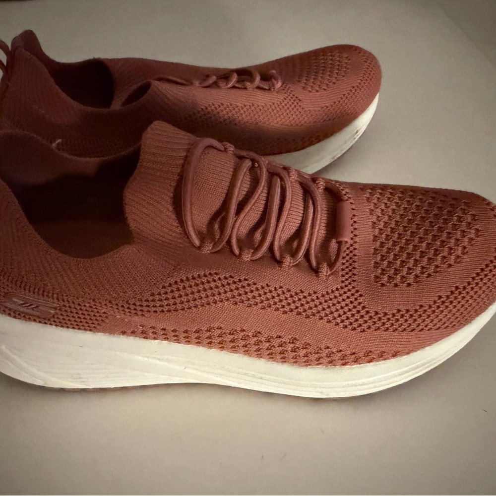 Skechers rose colored Bob’s with memory foam and bungee laces.